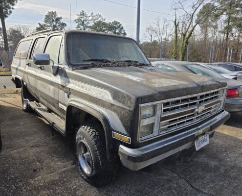 square body suburban with choo choo customs graphics