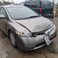 2007 Honda Civic Hybrid *Wrecked, Runs + Drives* - $950.00